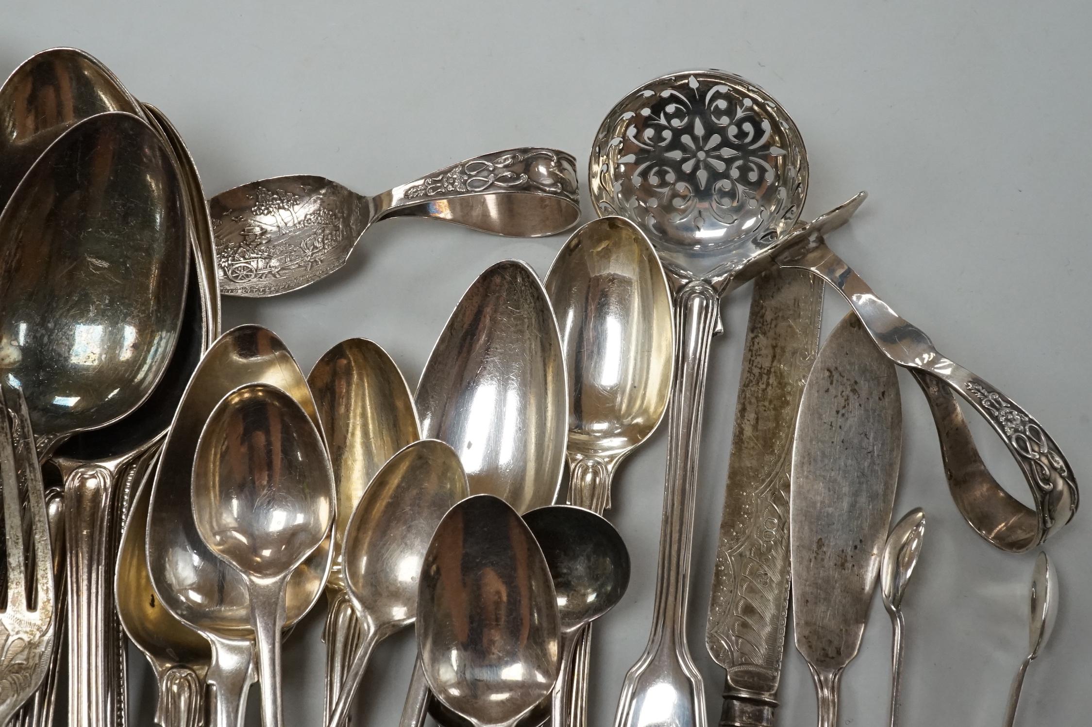 A quantity of assorted mainly 19th century and later silver flatware, various date and makers including three cased sets, 37.5oz.